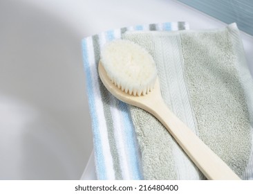 Body Brush On Towel