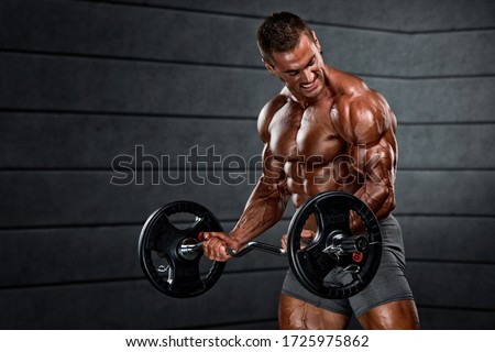 Body Builder Doing Barbell Bicep Curls