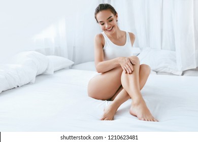 Body Care. Beautiful Woman With Smooth Soft Skin On Long Legs