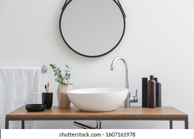 Body care cosmetics with accessories near sink in bathroom - Shutterstock ID 1607161978