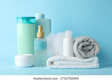 Body Care Products On Blue Background. Personal Hygiene