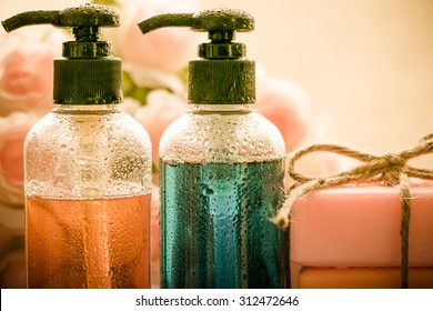 Body care product,shower,shampoo,soap on vintage tone with water drop