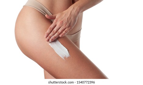 Body Care. Woman Applying Cream On Legs. Female Applying Anti Cellulite Cream