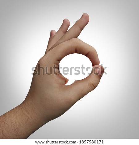 Body language concept and non-verbal or nonverbal communication with a hand making a gesture shaped as a word or speech bubble or deaf culture with fingers communicating in a silent voice.