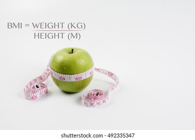 Body Mass Index (BMI) Formula With An Apple, Health Conceptual