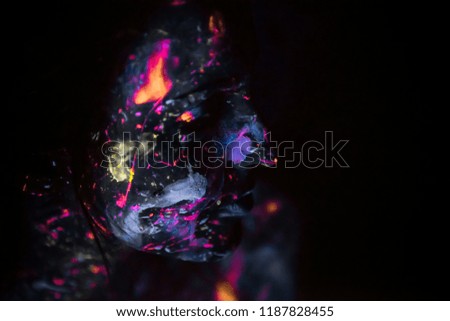 Body paint  in pretty woman painted in fluorescent powder