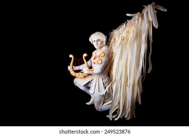 Body Painting With Hearts. White Angel Playing The Harp