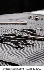 Body Piercing Equipment On A Sterile Mat In A Tattoo Shop