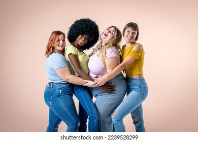 Body Positive and Acceptance, multiracial group of women with different body and ethnicity posing together to show the woman power and strength, curvy, plus size and skinny kind of female body concept - Powered by Shutterstock