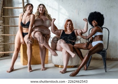 Body Positive and Acceptance, multiracial group of women  posing together to show the diversity of femaleness, curvy, plus size and skinny kind of female body concept, women power