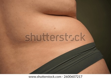 Body positivity and self acceptance: exploring natural beauty and individuality with an unretouched image of a confident individual