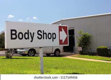 Body Shop Sign At Car Dealership 