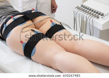 Image, Stock Photo Electro stimulation in physical therapy to a young woman