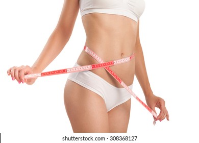 Body of woman with a measuring tape.