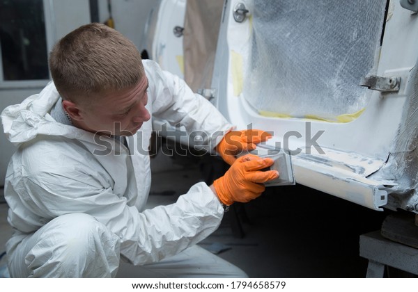 Body work
of the car. Car repair after an
accident.
