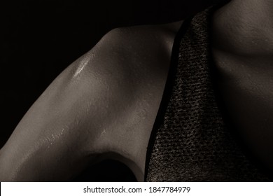 Body Of Young Fitness Woman Who Has Hot Sweat From Exercise, Sweaty On Neck Chest Chin Part. Low Exposure Dark Background Copy Space