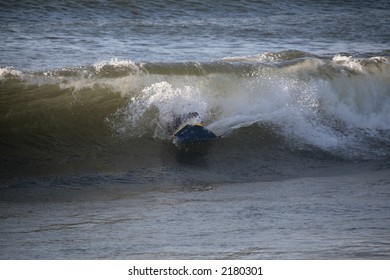 bodyboarder inside the wave