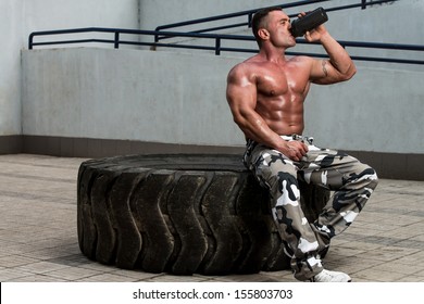 Bodybuilder Drinking