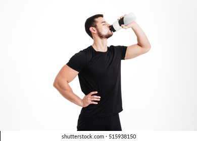 Bodybuilder Drinking Water. Isolated White Background