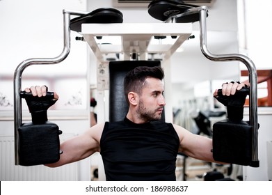 Bodybuilder In The Gym, Chest Exercise At Bench