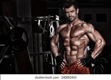 Bodybuilder Posing In The Gym