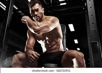 Bodybuilder posing in the gym