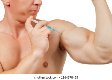 Bodybuilder Taking Steroids Injection In Arm. Man Is Taking Steroids