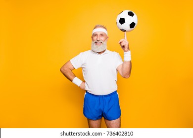Bodycare, healthcare, weight loss, pride, strength, leadership, motivation, happiness, authority, gym concept. Cool funny modern competetive pensioner, leader, champion plays with ball