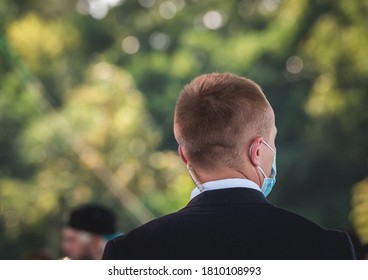 Bodyguard Man With Earphone And Black Eyeglasses And Business Suit. Security Guard With The Headset To Control People. Crowd.