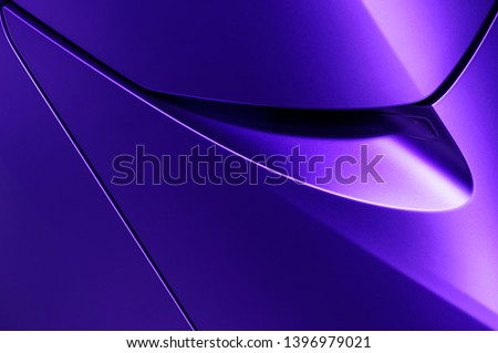 Bodywork of violet sedan, surface of sport car door and handle in ultramodern style, detail of concept racing vehicle 