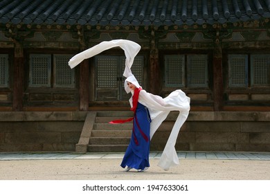 Boeun-gun, Chungcheongbuk-do, South Korea - June 15, 2014: A female in traditional clothe is doing Buddhist dance at Beopjusa Temple
