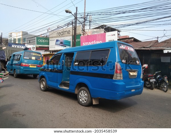Bogor, 30 August 2021 :\
Blue van is one of the public transportation facilities in the city\
of Bogor