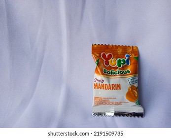 Bogor, Indonesia - August 19th, 2022 : Yupi Candy With Orange Flavor, Product Shot Candy