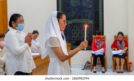 Bogor - Indonesia. August 20, 2020. The Atmosphere Of Catholic Adult Baptism During The COVID-19 Pandemic.