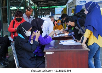 Bogor, Indonesia - August 9th 2022: Community Activities When Taking Care Of The Annual Vehicle Tax Extension At The One Stop Administration Services Office Bogor City Is Always Crowded Every Day