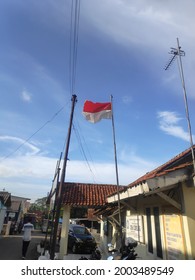 Bogor Indonesia,21 Feb 2020 - Indonesian Flag Flying In Front Of Community Service Building Under Clear Blue Sky