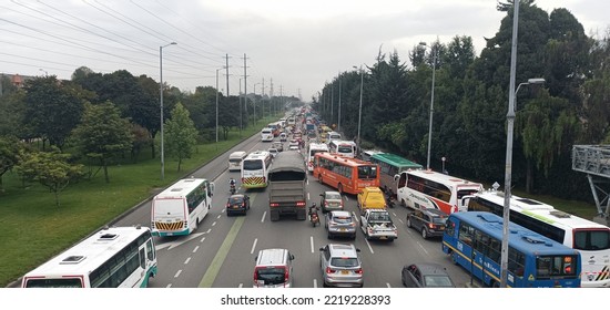 BOGOTA, COLOMBIA - OCTOBER 20 OF 2022 SITP  High Traffic Jam At North Highway With School And Public Transportation Bus On Normal Working Morning Day