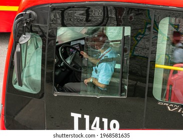 BOGOTA,COLOMBIA; MAY 4TH 2021: Bogota Citizens Getting Down From Transmilenio Buses Due A Traffic Jam Caused By A Protest Nearby.