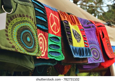 Bohemian bags made from natural materials at a clothes stand in a hippy festival market - Shutterstock ID 782731102