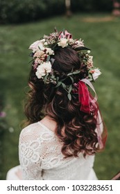 Bohemian Bride With Long Brown Hair And Flower Crown At The Wedding