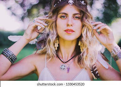 Bohemian Hippie Girl In White Dress.
Woman Hands With Lot Of Boho Style Jewelry, Blue Rings,silver Bracelets And Henna Tattoo. Coachella Fashion Style Idea, Outfit .