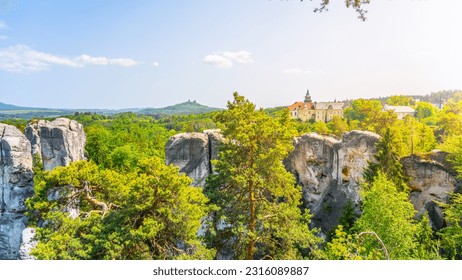 Bohemian Paradise, Czech: Cesky Raj, panorama. View of Hruba Skala Castle, Trosky Castle Ruins and sandstone rocks from Marianska Lookout on sunny summer day, Czech Republic