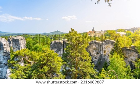 Bohemian Paradise, Czech: Cesky Raj, panorama. View of Hruba Skala Castle, Trosky Castle Ruins and sandstone rocks from Marianska Lookout on sunny summer day, Czech Republic