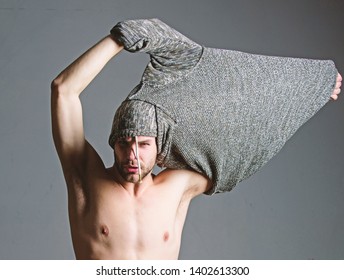 Bohemian Sexy Body. Object Of Desire Concept. Caught In State Of Undress. Man Handsome Sexy Hipster Undressing. Guy Sexy Muscular Torso Take Off Clothes Grey Background. Seductive Macho Feeling Sexy.