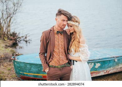 Bohemian Wedding On The Sea. Stylish And Young Couple