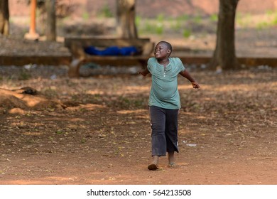 BOHICON, BENIN - JAN 11, 2017: Unidentified Beninese Children Play Football With Bare Feet. Soccer Is Very Popular Game Among The  African Kids