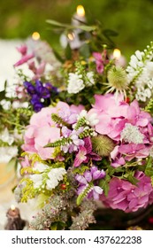 boho composition with hydrangea, lupine and herbs