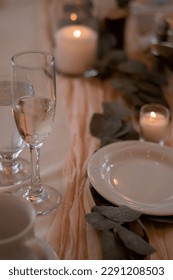 Boho style table setting with blush pink and beige linen