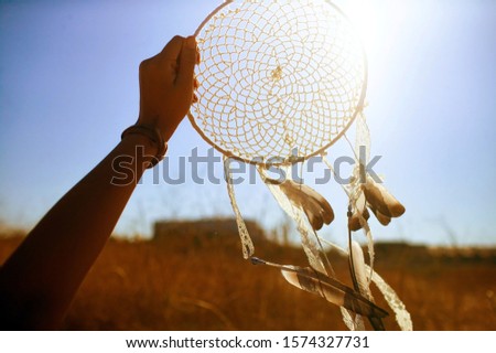 Boho style, wedding decoration. Ease and simplicity. Dream catcher white color, knit. 