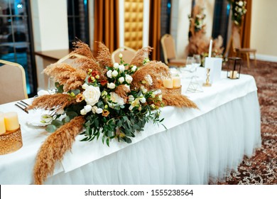 Boho Style Wedding Decoration In Light Colors, Decorated With Pampas Grass